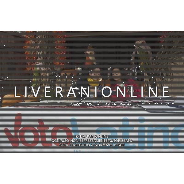 Yeimmy Torrez, left, and Dabrali Diaz, right, at the voter registration table at Mamajuana restaurant.The volunteers are members of the Sigma Lambda Upsilon sorority. VotoLatino organizes a voter registration block fair on Dyckman Street in the Inwood neighborhood of New York on Sunday, October 7, 2012, 2012. The voting block of Hispanics has become increasingly important in both local and national elections.(å Richard B. Levine) ©photoshot/AGENZIA ALDO LIVERANI SAS - ITALY ONLY - EDITORIAL USE ONLY