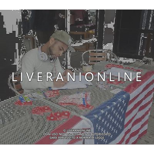 Aneudy Hernandez registers to vote in front of Papasito restaurant. VotoLatino organizes a voter registration block fair on Dyckman Street in the Inwood neighborhood of New York on Sunday, October 7, 2012, 2012. The voting block of Hispanics has become increasingly important in both local and national elections.(å Richard B. Levine) ©photoshot/AGENZIA ALDO LIVERANI SAS - ITALY ONLY - EDITORIAL USE ONLY