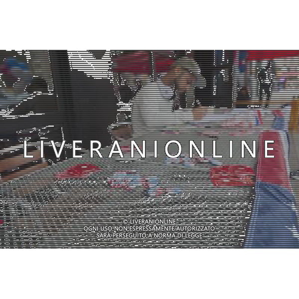 Aneudy Hernandez registers to vote in front of Papasito restaurant. VotoLatino organizes a voter registration block fair on Dyckman Street in the Inwood neighborhood of New York on Sunday, October 7, 2012, 2012. The voting block of Hispanics has become increasingly important in both local and national elections.(å Richard B. Levine) ©photoshot/AGENZIA ALDO LIVERANI SAS - ITALY ONLY - EDITORIAL USE ONLY