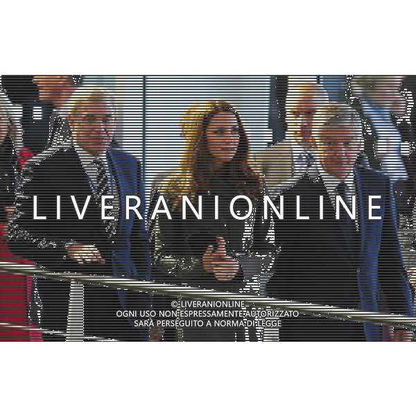 The Duchess of Cambridge with Trevor Brooking and David Bernstein (right) during the official launch of The Football Association\'s National Football Centre at St George\'s Park in Burton-upon-Trent, England. ©photoshot/AGENZIA ALDO LIVERANI SAS - ITALY ONLY - REALI INGLESI: Il principe William e la moglie Kate Middleton alla presentazione ufficiale di The Football Association National Football Centre al Parco di San Giorgio a Burton upon Trent, Inghilterra 09/10/2012. 