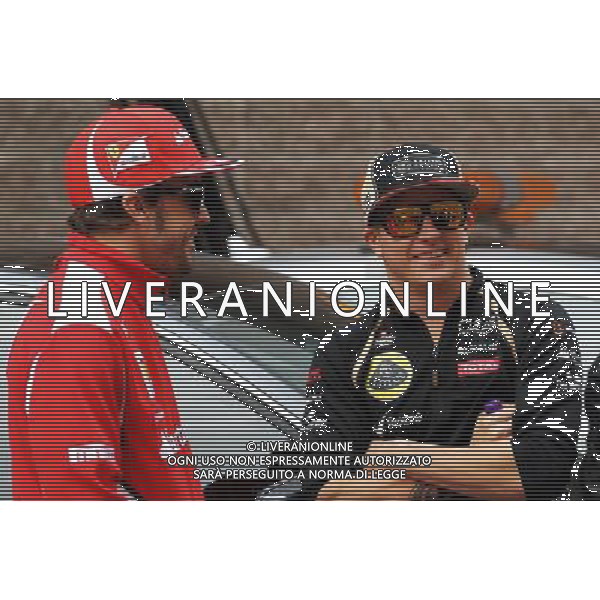 (L to R): Fernando Alonso (ESP) Ferrari with Kimi Raikkonen (FIN) Lotus F1 Team. 14.10.2012. Formula 1 World Championship, Rd 16, Korean Grand Prix, Yeongam, South Korea, Race Day. - www.xpbimages.com, EMail: requests@xpbimages.com - copy of publication required for printed pictures. Every used picture is fee-liable. © Copyright: Batchelor / XPB Images AG ALD LIVERANI S A S ONLY ITALY