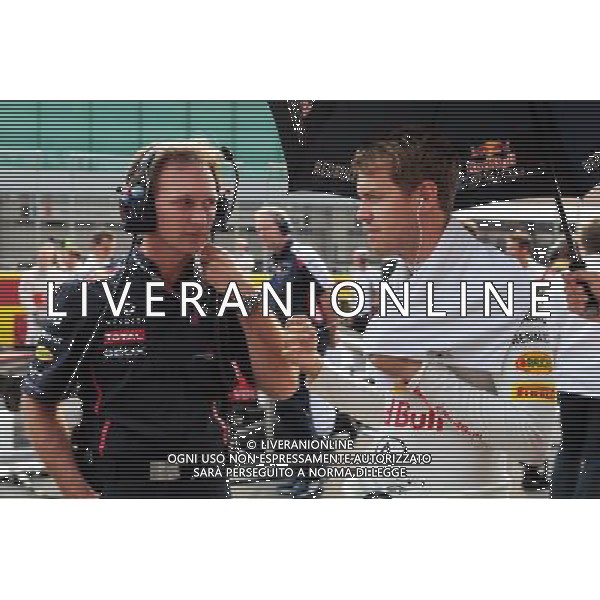 Christian Horner (GBR) Red Bull Racing Team Principal with Sebastian Vettel (GER) Red Bull Racing on the grid. 14.10.2012. Formula 1 World Championship, Rd 16, Korean Grand Prix, Yeongam, South Korea, Race Day. - www.xpbimages.com, EMail: requests@xpbimages.com - copy of publication required for printed pictures. Every used picture is fee-liable. © Copyright: Batchelor / XPB Images AG ALD LIVERANI S A S ONLY ITALY
