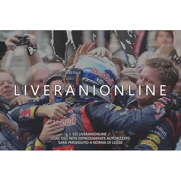 Sebastian Vettel (GER), Red Bull Racing with the team 14.10.2012. Formula 1 World Championship, Rd 16, Korean Grand Prix, Yeongam, Korea, Race Day - www.xpbimages.com, EMail: requests@xpbimages.com - copy of publication required for printed pictures. Every used picture is fee-liable. © Copyright: Batchelor / XPB Images AG ALD LIVERANI S A S ONLY ITALY