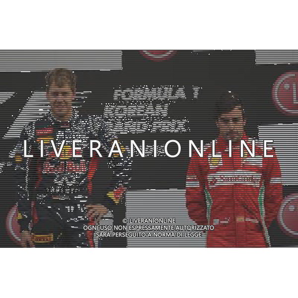 1st place Sebastian Vettel (GER) and 3rd place Fernando Alonso (ESP), Scuderia Ferrari 14.10.2012. Formula 1 World Championship, Rd 16, Korean Grand Prix, Yeongam, Korea, Race Day - www.xpbimages.com, EMail: requests@xpbimages.com - copy of publication required for printed pictures. Every used picture is fee-liable. © Copyright: Batchelor / XPB Images AG ALD LIVERANI S A S ONLY ITALY