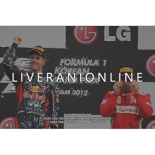 1st place Sebastian Vettel (GER) and 3rd place Fernando Alonso (ESP), Scuderia Ferrari 14.10.2012. Formula 1 World Championship, Rd 16, Korean Grand Prix, Yeongam, Korea, Race Day - www.xpbimages.com, EMail: requests@xpbimages.com - copy of publication required for printed pictures. Every used picture is fee-liable. © Copyright: Batchelor / XPB Images AG ALD LIVERANI S A S ONLY ITALY