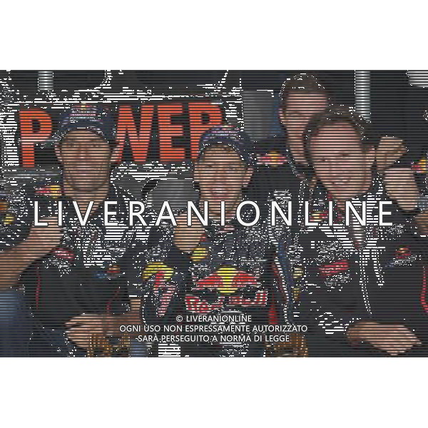 Mark Webber (AUS), Red Bull Racing celebrates with Sebastian Vettel (GER), Red Bull Racing and Christian Horner (GBR) Red Bull Racing Team Principal 14.10.2012. Formula 1 World Championship, Rd 16, Korean Grand Prix, Yeongam, Korea, Race Day - www.xpbimages.com, EMail: requests@xpbimages.com - copy of publication required for printed pictures. Every used picture is fee-liable. © Copyright: Batchelor / XPB Images AG ALD LIVERANI S A S ONLY ITALY