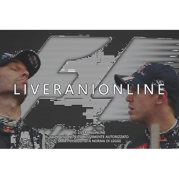 (L to R): Mark Webber (AUS) Red Bull Racing with race winner Sebastian Vettel (GER) Red Bull Racing on the podium. 14.10.2012. Formula 1 World Championship, Rd 16, Korean Grand Prix, Yeongam, South Korea, Race Day. - www.xpbimages.com, EMail: requests@xpbimages.com - copy of publication required for printed pictures. Every used picture is fee-liable. © Copyright: Photo4 / XPB Images AG ALDO LIVERANI S A S ONLY ITALY