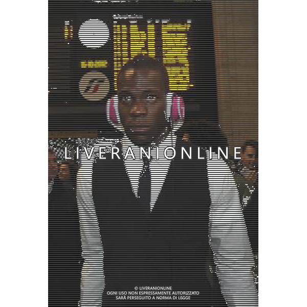 MILANO STAZIONE CENTRALE 15/10/2012 ARRIVO NAZIONALE ITALIANA DI CALCIO PER L\'INCONTRO CON LA DANIMARCA QUALIF BRASILE 2014 NELLA FOTO MARIO BALOTELLI FOTO MARIO ROMANO-AG ALDO LIVERANI S A S