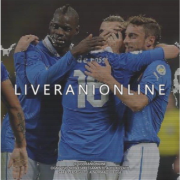 Qualificazioni ai Campionati Mondiali di Calcio Brasile FIFA 2014 Gruppo B Milano- 16.10.2012 Italia-Danimarca Nella Foto:de rossi esulta con marchisio e balotelli /Ph.Vitez-Ag. Aldo Liverani