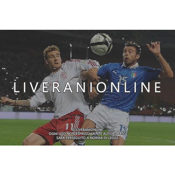 Qualificazioni ai Campionati Mondiali di Calcio Brasile FIFA 2014 Gruppo B Milano- 16.10.2012 Italia-Danimarca Nella Foto:barzagli-bendtner /Ph.Vitez-Ag. Aldo Liverani