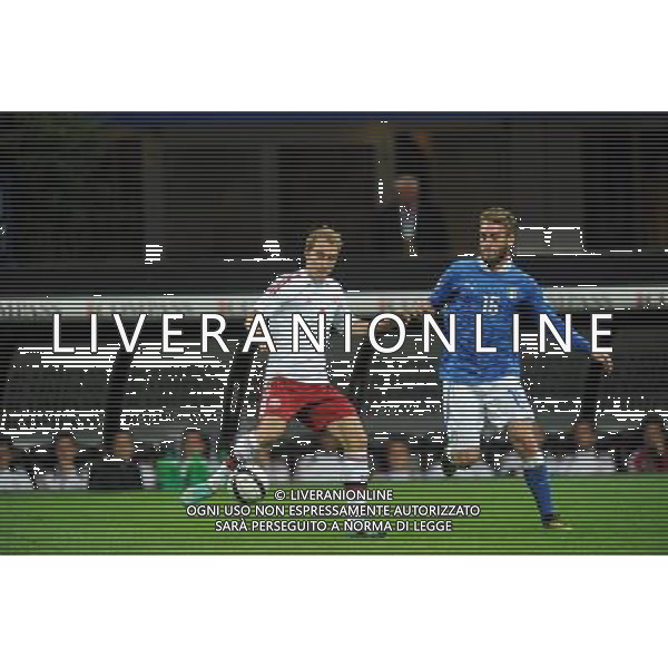 Italia-Danimarca Qualificazioni ai Campionati Mondiali di Calcio Brasile FIFA 2014 Gruppo B Milano- 16.10.2012 NELLA FOTO : CHRISTIAN ERIKSEN - DANIELE DE ROSSI ©Ravezzani/AGENZIA ALDO LIVERANI SAS