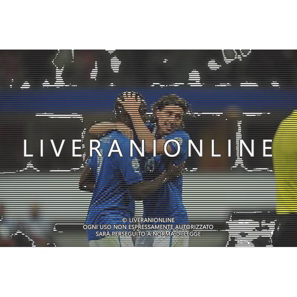 Italia-Danimarca Qualificazioni ai Campionati Mondiali di Calcio Brasile FIFA 2014 Gruppo B Milano- 16.10.2012 NELLA FOTO : ESULTANZA MARIO BALOTELLI E RICCARDO MONTOLIVO ©Ravezzani/AGENZIA ALDO LIVERANI SAS