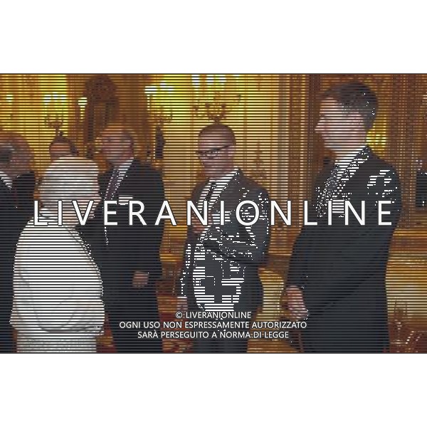 Previously unreleased photo taken on 16/10/2012 of Heston Blumenthal and Jeremy Hunt meeting the Queen, as they attended a glittering Buckingham Palace reception hosted by the Queen and Duke of Edinburgh for those who made the regional, national and international celebrations events to remember. ©photoshot/AGENZIA ALDO LIVERANI SAS - ITALY ONLY - REALI INGLESI: La Regina Elisabetta II d\'inghilterra durante un ricevimento per gli organizzatori e sostenitori delle celebrazioni per il Giubileo di diamante a Buckingham Palace a Londra