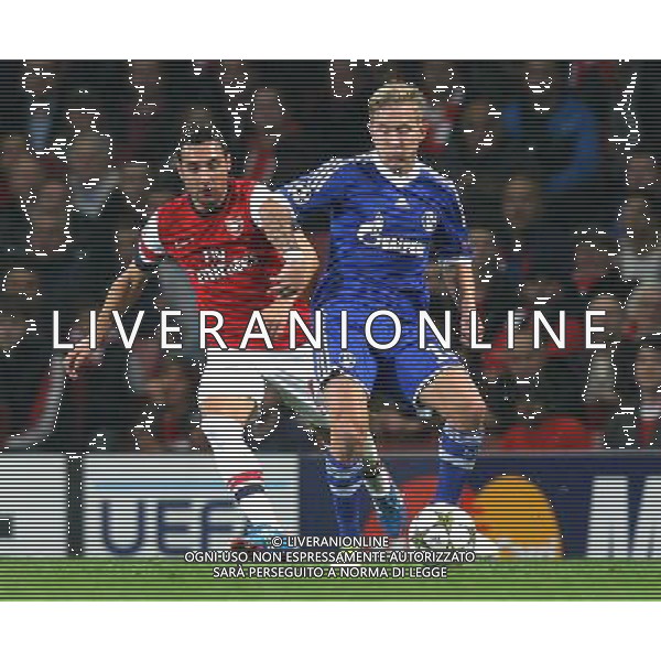 Arsenal\'s Santi Cazorla battles with Schalke\'s Lewis Holtby Football - UEFA Champions League Group B - Arsenal v Schalke - Wednesday 24th October 2012 - Emirates Stadium - London © CameraSport - 43 Linden Ave. Countesthorpe. Leicester. England. LE8 5PG - Tel: +44 (0) 116 277 4147 - admin@camerasport.com - www.camerasport.com AG ALDO LIVERANI S A S ONLY ITALY