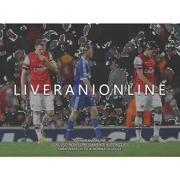 Arsenal\'s Thomas Vermaelen and Arsenal\'s Andre Santos show their dejection as Schalketake a 0-2 lead Football - UEFA Champions League Group B - Arsenal v Schalke - Wednesday 24th October 2012 - Emirates Stadium - London © CameraSport - 43 Linden Ave. Countesthorpe. Leicester. England. LE8 5PG - Tel: +44 (0) 116 277 4147 - admin@camerasport.com - www.camerasport.com AG ALDO LIVERANI S A S ONLY ITALY