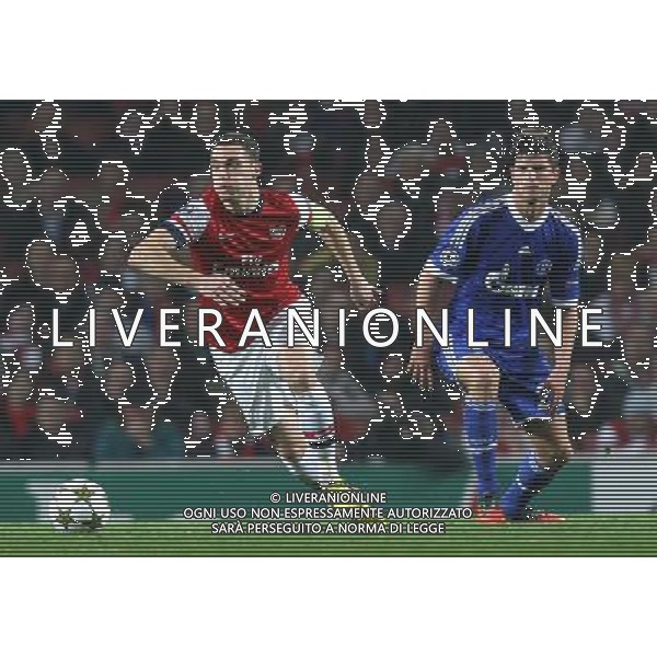 Arsenal\'s Thomas Vermaelen and Schalke\'s Klaas Jan Huntelaar Football - UEFA Champions League Group B - Arsenal v Schalke - Wednesday 24th October 2012 - Emirates Stadium - London © CameraSport - 43 Linden Ave. Countesthorpe. Leicester. England. LE8 5PG - Tel: +44 (0) 116 277 4147 - admin@camerasport.com - www.camerasport.com AG ALDO LIVERANI S A S ONLY ITALY