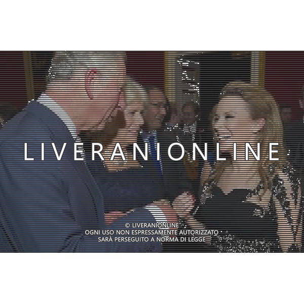 Australian pop singer, Kylie Minogue (R), meets Britain\'s Prince Charles and his wife Camilla, Duchess of Cornwall at St James\'s Palace in central London on October 24, 2012, during a reception for prominent Papua New Guineans, Australians and New Zealanders living in the UK ahead of their tour Papua New Guinea, Australia and New Zealand. ©photohsot/AGENZIA ALDO LIVERANI SAS - ITALY ONLY - REALI INGLESI: Il principe Carlo d\'inghilterra e la moglie Camilla, duchessa di Cornovaglia durante un ricevimento per le comunita\' Papua Nuova Guinea, australiana e neozelandese che vivono nel Regno Unito, presso il Palazzo San Giacomo nel centro di Londra il 24 ottobre 2012