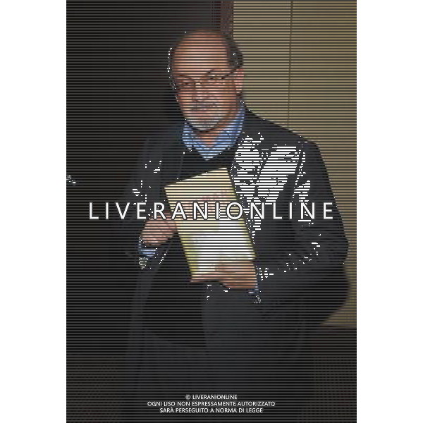 26 October 2012 - Hamilton, Ontario, Canada. British author Salman Rushdie poses in the green room with a copy of his book \'Joseph Anton: A Memoir\' during an apperance at the Lincoln Alexander Centre. Photo Credit: Brent Perniac/AdMedia AG ALDO LIVERANI S A S ONLY ITALY