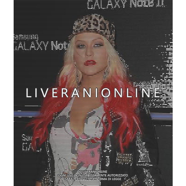 25 October 2012 - Beverly Hills, California - Christina Aguilera. Samsung Mobile Launch Party For The New Samsung Galaxy Note II Held At Private Residence. Photo Credit: Kevan Brooks/AdMedia /AGENZIA ALDO LIVERANI SAS/ITALY ONLY - EDITORIAL USE ONLY