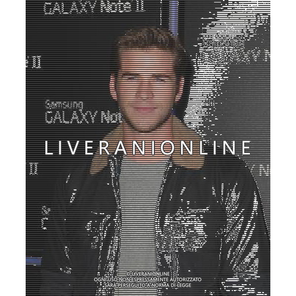25 October 2012 - Beverly Hills, California - Liam Hemsworth. Samsung Mobile Launch Party For The New Samsung Galaxy Note II Held At Private Residence. Photo Credit: Kevan Brooks/AdMedia /AGENZIA ALDO LIVERANI SAS/ITALY ONLY - EDITORIAL USE ONLY