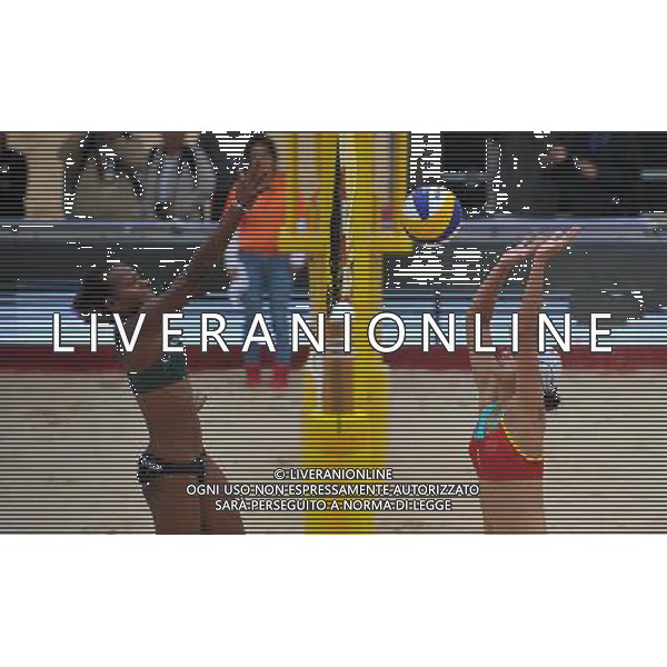 (121101) -- HAIKOU, Nov. 1, 2012 () -- Iatika Henriette (L) of Vanuatu competes at the 2012 Asian Beach Volleyball Championships in Haikou, capital of south China\'s Hainan Province, Nov. 1, 2012. A total of 37 teams from 13 countries and regions took part in the four-day competition from Nov. 1. (/Guo Cheng) AG ALDO LIVERANI S A S ONLY ITALY
