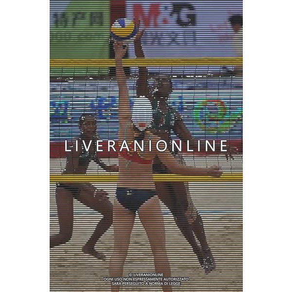 (121101) -- HAIKOU, Nov. 1, 2012 () -- Elwin Miller (R) of Vanuatu competes at the 2012 Asian Beach Volleyball Championships in Haikou, capital of south China\'s Hainan Province, Nov. 1, 2012. A total of 37 teams from 13 countries and regions took part in the four-day competition from Nov. 1. (/Guo Cheng) AG ALDO LIVERANI S A S ONLY ITALY