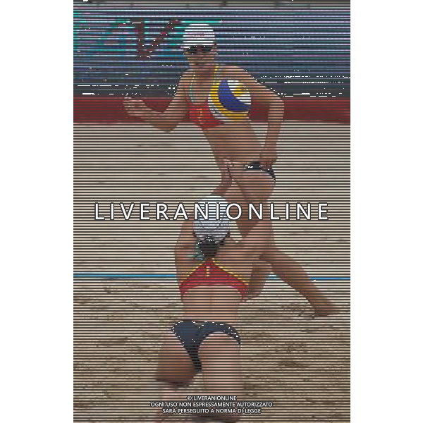 (121101) -- HAIKOU, Nov. 1, 2012 () -- Li Ying (Back) of China competes at the 2012 Asian Beach Volleyball Championships in Haikou, capital of south China\'s Hainan Province, Nov. 1, 2012. A total of 37 teams from 13 countries and regions took part in the four-day competition from Nov. 1. (/Guo Cheng) AG ALDO LIVERANI S A S ONLY ITALY
