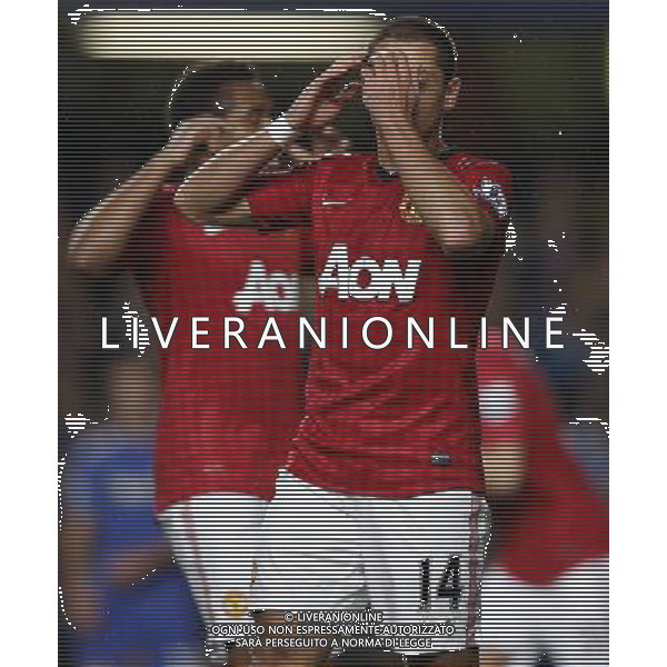 (121101) -- LONDON, Nov. 1, 2012 () -- Javier Hernandez of Manchester United reacts during the Capital One Cup Fourth Round match between Chelsea and Manchester United in London, Britain, on Oct. 31, 2012. Manchester United lost 4-5. (/Wang Lili) FOR EDITORIAL USE ONLY. NOT FOR SALE FOR MARKETING OR ADVERTISING CAMPAIGNS. NO USE WITH UNAUTHORIZED AUDIO, VIDEO, DATA, FIXTURE LISTS, CLUB/LEAGUE LOGOS OR \'LIVE\' SERVICES. ONLINE IN-MATCH USE LIMITED TO 45 IMAGES, NO VIDEO EMULATION. NO USE IN BETTING, GAMES OR SINGLE CLUB/LEAGUE/PLAYER PUBLICATIONS. AG ALDO LIVERANI S A S ONLY ITALY