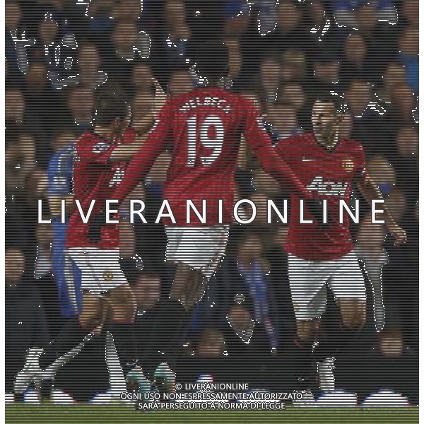 (121101) -- LONDON, Nov. 1, 2012 () -- Ryan Giggs (R) of Manchester United celebrates scoring with Javier Hernandez (L) during the Capital One Cup Fourth Round match between Chelsea and Manchester United in London, Britain, on Oct. 31, 2012. Manchester United lost 4-5. (/Wang Lili) FOR EDITORIAL USE ONLY. NOT FOR SALE FOR MARKETING OR ADVERTISING CAMPAIGNS. NO USE WITH UNAUTHORIZED AUDIO, VIDEO, DATA, FIXTURE LISTS, CLUB/LEAGUE LOGOS OR \'LIVE\' SERVICES. ONLINE IN-MATCH USE LIMITED TO 45 IMAGES, NO VIDEO EMULATION. NO USE IN BETTING, GAMES OR SINGLE CLUB/LEAGUE/PLAYER PUBLICATIONS. AG ALDO LIVERANI S A S ONLY ITALY