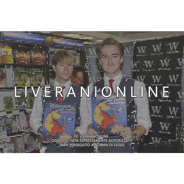 Tom Fletcher \' Dougie Poynter of McFly at a signing of their new children\'s book \'The Dinosaur That Pooped Christmas\' at Waterstones, Bluewater Shopping Centre, Greenhithe, Kent on Thursday 1 November 2012. /AGENZIA ALDO LIVERANI SAS/ITALY ONLY - EDITORIAL USE ONLY