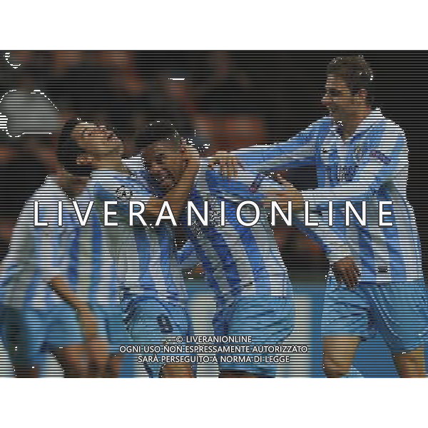 UEFA Champions League 2012/2013 Gruppo C Milano - 06.11.2012 Milan-Malaga Nella Foto:eliseu esulta con saviola e joaquin /Ph.Vitez-Ag. Aldo Liverani