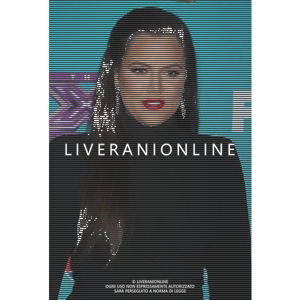 05 November 2012 - Beverly Hills, California - Khloe Kardashian Odom. \'The X Factor\' Season 2 Finalists Party held at The Bazaar at The SLS Hotel Beverly Hills. Photo Credit: Russ Elliot/AdMedia /AGENZIA ALDO LIVERANI SAS/ITALY ONLY - EDITORIAL USE ONLY