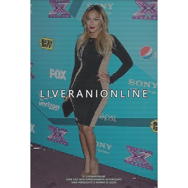 05 November 2012 - Beverly Hills, California - Adrienne Bailon. \'The X Factor\' Season 2 Finalists Party held at The Bazaar at The SLS Hotel Beverly Hills. Photo Credit: Russ Elliot/AdMedia /AGENZIA ALDO LIVERANI SAS/ITALY ONLY - EDITORIAL USE ONLY