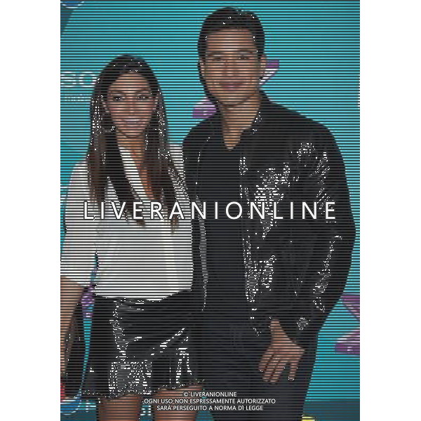 05 November 2012 - Beverly Hills, California - Mario Lopez and Courtney Mazza. \'The X Factor\' Season 2 Finalists Party held at The Bazaar at The SLS Hotel Beverly Hills. Photo Credit: Russ Elliot/AdMedia /AGENZIA ALDO LIVERANI SAS/ITALY ONLY - EDITORIAL USE ONLY