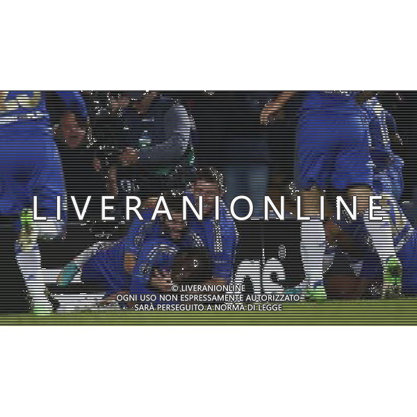 (121108) -- LONDON, Nov. 8, 2012 () -- Chelsea\'s Victor Moses (Bottom) celebrates his goal with Juan Mata (C) and Gary Cahill (Top) during the UEFA Champions League Group E match between Chelsea and Shakhtar Donetsk in London, Britain, on Nov. 7, 2012. Chelsea won 3-2. (/Wang Lili) AG ALDO LIVERANI S A S ONLY ITALY
