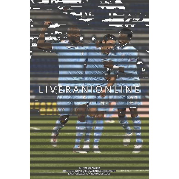 Roma - 08/11/2012 - Stadio Olimpico - Uefa Europa League 2012/2013 - Girone J - Lazio vs Panathinaikos - nella foto: floccari festeggiato da ciani ed onazi dopo il gol del 3 a 0 Â© Fabrizio Corradetti - Ag. Aldo Liverani sas