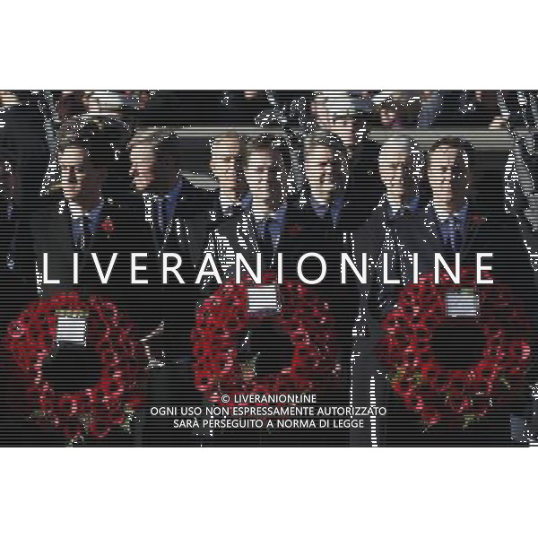 Britain\'s Prime Minister David Cameron (Front-R), Deputy Prime Minister Nick Clegg (Front-C) and leader of the Labour Party Ed Miliband (Front-L) stand in front of former prime ministers John Major (back-R) and Tony Blair (Back-C), attend the Remembrance Sunday service in Whitehall, Central London, Britain 11 November 2012. Services are held annually across Commonwealth countries during Remembrance Day to commemorate servicemen and women who have fallen in the line of duty since World War I.