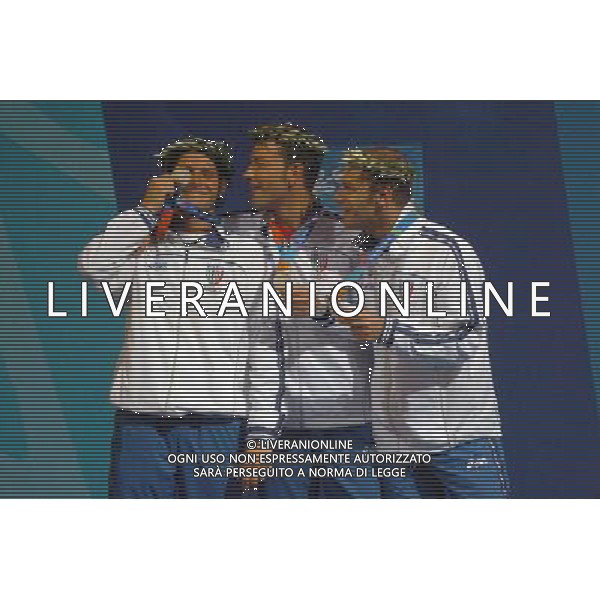 OLIMPIADI DI ATENE 19/08/2004 FINALE SCIABOLA A SQUADRE NELLA FOTO LUIGI TARANTINO, GIAMPIERO PASTORE E ALDO MONTANO MEDAGLIA D\'ARGENTO FOTO MARCO LUZZANI/AG ALDO LIVERANI