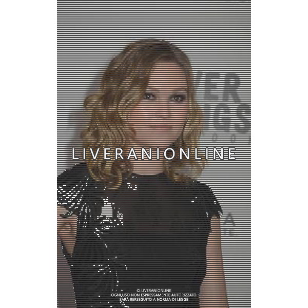 Julia Stiles in Tony Ward black dress attends the New York Premiere of \' Silver Linings Playbook\' on November 12, 2012 at the Ziegfeld Theatre in New York City. The movie stars Bradley Cooper, Robert De Niro, Jacki Weaver, Chris Tucker, Julia Stiles, John Ortiz, Brea Bee, Anupam Kher, Shea Whigham and is directed by David O. Russell. /AGENZIA ALDO LIVERANI SAS/ITALY ONLY - EDITORIAL USE ONLY