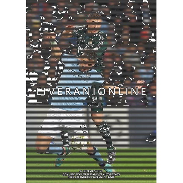 Manchester City\'s Aleksandar Kolarov and Real Madrid\'s Karim Benzema battle for the ball..Football - UEFA Champions League Group D - Manchester City v Real Madrid - Wednesday 21st November 2012 - Etihad Stadium - Manchester.. AG ALDO LIVERANI S A S ONLY ITALY