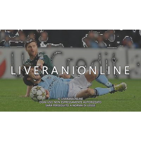 Manchester City\'s David Silva is tackled by Real Madrid\'s Xabi Alonso ..Football - UEFA Champions League Group D - Manchester City v Real Madrid - Wednesday 21st November 2012 - Etihad Stadium - Manchester.. AG ALDO LIVERANI S A S ONLY ITALY