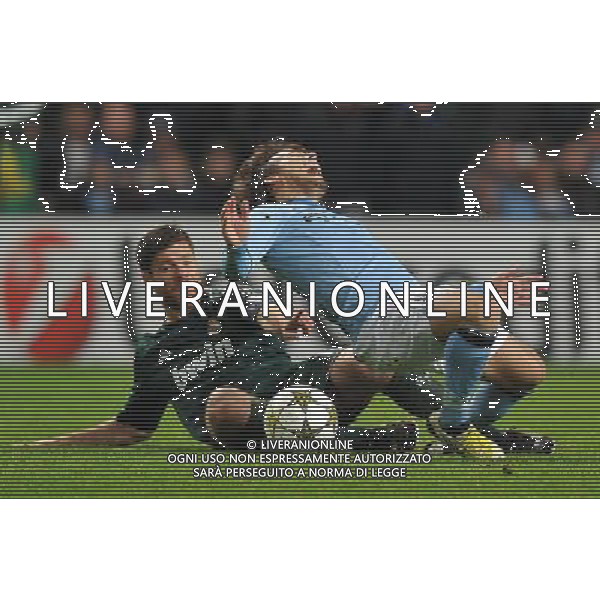 Manchester City\'s David Silva is tackled by Real Madrid\'s Xabi Alonso ..Football - UEFA Champions League Group D - Manchester City v Real Madrid - Wednesday 21st November 2012 - Etihad Stadium - Manchester.. AG ALDO LIVERANI S A S ONLY ITALY