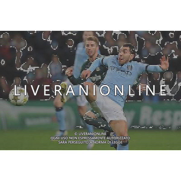 Manchester City\'s Carlos Tevez has a lunge for goal Football - UEFA Champions League Group D - Manchester City v Real Madrid - Wednesday 21st November 2012 - Etihad Stadium - Manchester å© CameraSport - 43 Linden Ave. Countesthorpe. Leicester. England. LE8 5PG - Tel: +44 (0) 116 277 4147 - admin@camerasport.com - www.camerasport.com AG ALDO LIVERANI S A S ONLY ITALY