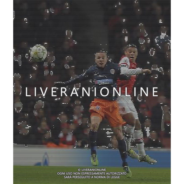 Emirates Stadium Arsenal v Montpelier League 21/11/2012 Alex Oxlade Chamberlain (Arsenal) Anthony Mounier (Montpelier) Photo:Roger Parker Fotosports International AG ALDO LIVERANI S A S ONLY ITALY