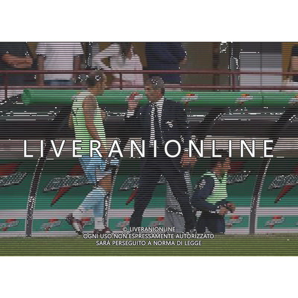 Milano Stadio di san Siro 21/08/2004 Milan - Lazio Supercoppa Italiana nella foto Domenico Caso e Paolo Di Canio foto filippo venezia/ag aldo liverani