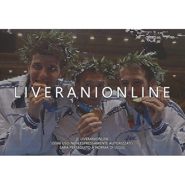OLIMPIADI ATENE 21/08/2004 FIORETTO A SQUADRE MEDAGLIA D\'ORO ANDREA CASSARA\', SALVATORE SANZO E VANNI SIMONE FOTO MARCO LUZZANI/AG ALDO LIVERANI