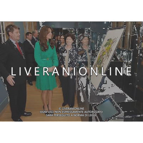 RETRANSMITTED WITH ADDITIONAL INFORMATION. The Duchess of Cambridge views a plate from Audubon\'s Birds of America alongside Director of the Natural History Museum Doctor Michael Dixon (left) and Special Collections Manager Judith Magee (right) during a visit to officially open the new Treasures Gallery, at the Natural History Museum, in central London. ©photoshot/AGENZIA ALDO LIVERANI SAS - ITALY ONLY - REALI INGLESI: La duchessa di Cambridge Kate Middleton durante una visita per aprire ufficialmente la nuova galleria Tesori, presso il Museo di Storia Naturale, nel centro di Londra. 