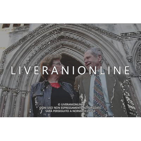 Sarah Hermitage (L) and her husband Stewart Middleton pose for a photograph out side The Royal Courts of Justice in London Britain 30 November 201. Reginald Mengi claims that she has libeled him by claiming that he undertook a campaign of harrassment, that resulted in Hermitage having to leave her farm in Tanzania. ©PHOTOSHOT/Agenzia Aldo Liverani Sas - ITALY ONLY - EDITORIAL USE ONLY