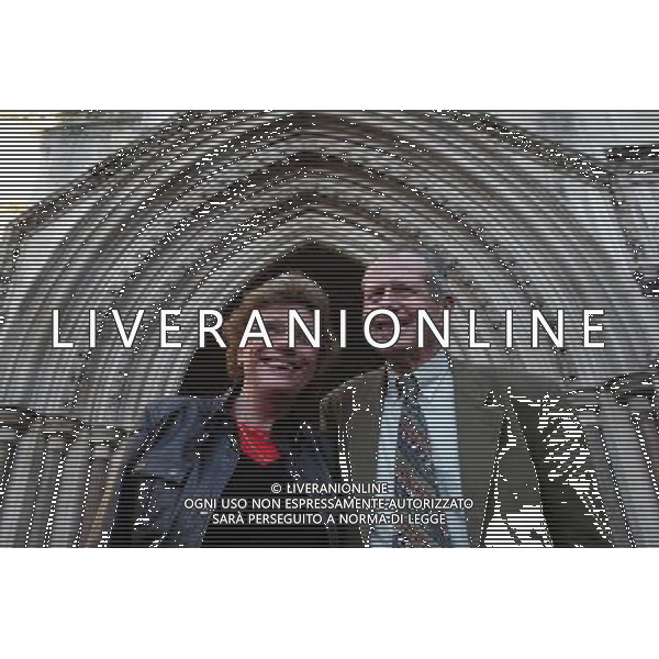 Sarah Hermitage (L) and her husband Stewart Middleton pose for a photograph out side The Royal Courts of Justice in London Britain 30 November 201. Reginald Mengi claims that she has libeled him by claiming that he undertook a campaign of harrassment, that resulted in Hermitage having to leave her farm in Tanzania. ©PHOTOSHOT/Agenzia Aldo Liverani Sas - ITALY ONLY - EDITORIAL USE ONLY