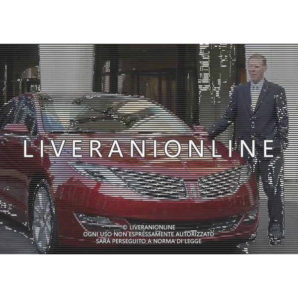 NEW YORK, NY - DECEMBER 03: Ford Motor Company President and CEO Alan Mulally stands beside a new Lincoln Motor Company MKZ sedan at a media launch in front of Avery Fisher Hall, Lincoln Center Plaza on December 3, 2012 in New York City. Ford is renaming its Lincoln division as the Lincoln Motor Co., as it looks to revive the luxury brand. The MKZ will arrive at dealerships later this month and will start at $35,925. The MKZ is the first of seven new Lincoln\'s that will go on sale by 2015. /AGENZIA ALDO LIVERANI SAS/ITALY ONLY - EDITORIAL USE ONLY